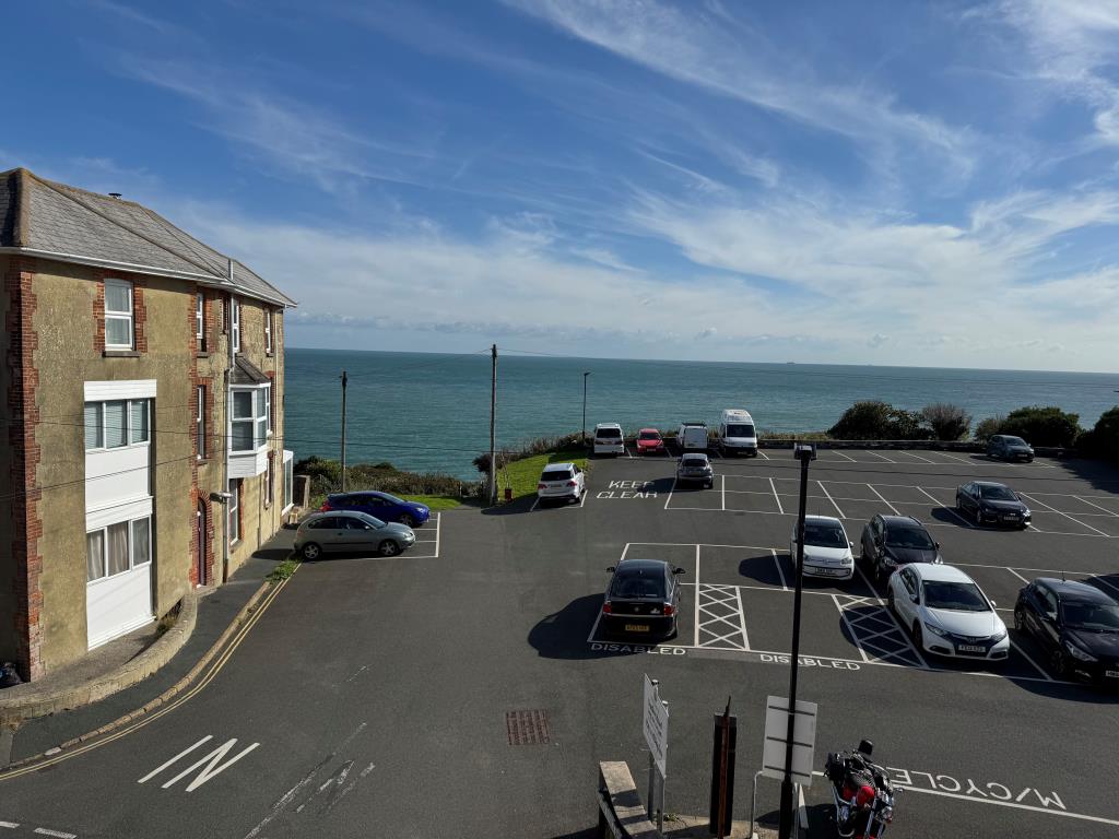 Lot: 141 - FOUR-BEDROOM HOUSE FOR IMPROVEMENT WITH SEA VIEWS - The View From a Front Bedroom